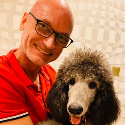 Andreas West, founder of yourDNA.family, with his standard poodle